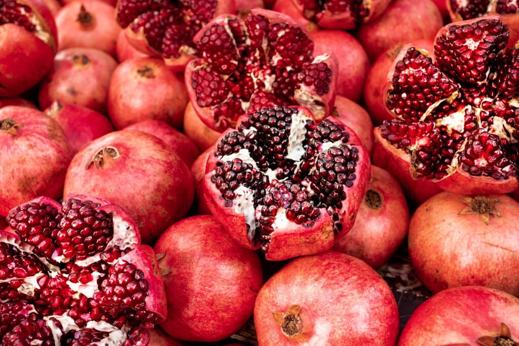 Cracked pomegranate. Ripe Pomegranates Background